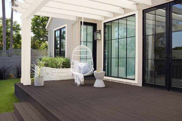Beautiful porch-deck of a beautiful home exterior. This house features Cordovan Brown in its solid version. 
