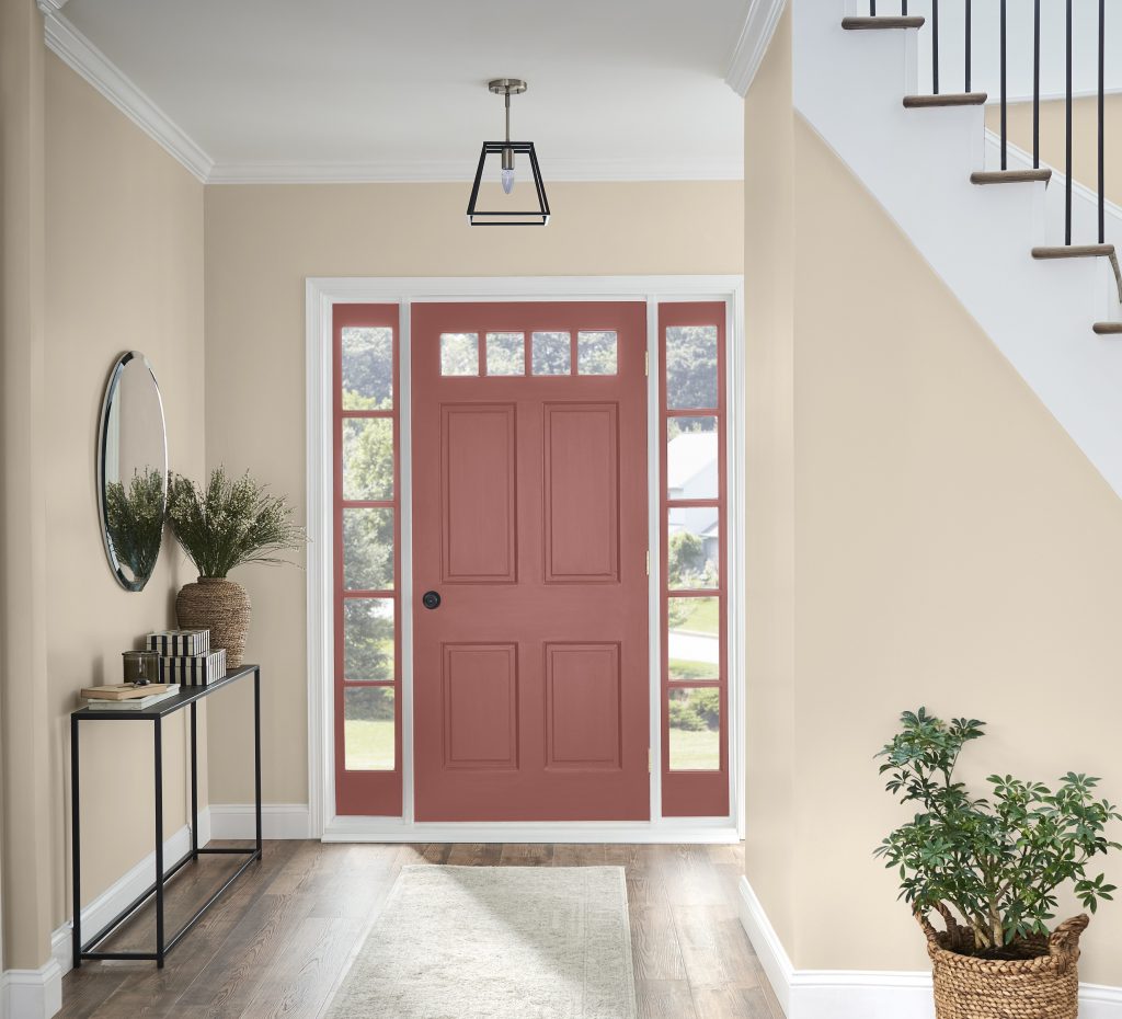 A home entry featuring a red door, the paint color is Vermilion. 