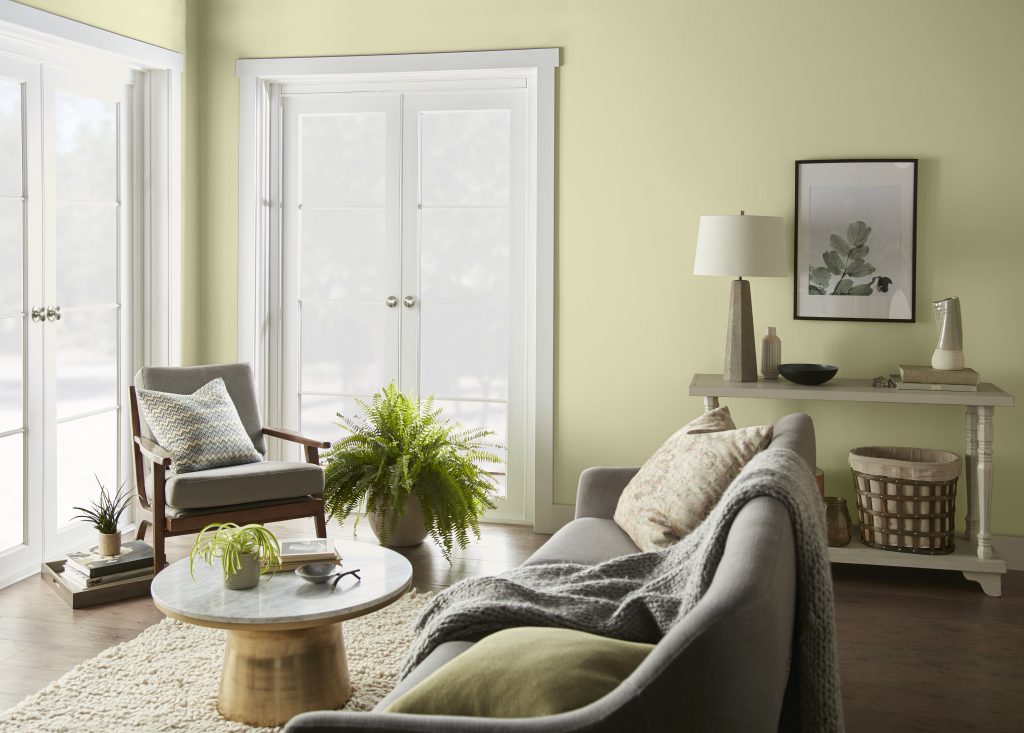 living room with a soothing green hue. 