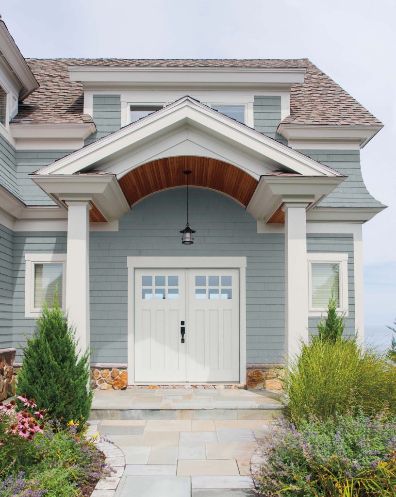 A home showing the front door painted in white.