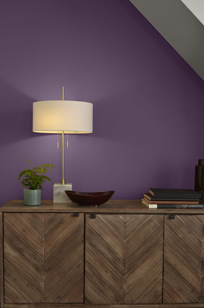A corner of a room showing the wall in a deep purple color.