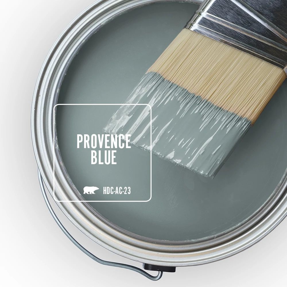 The top view of an open paint can, featuring a blue green color called Provence Blue. 