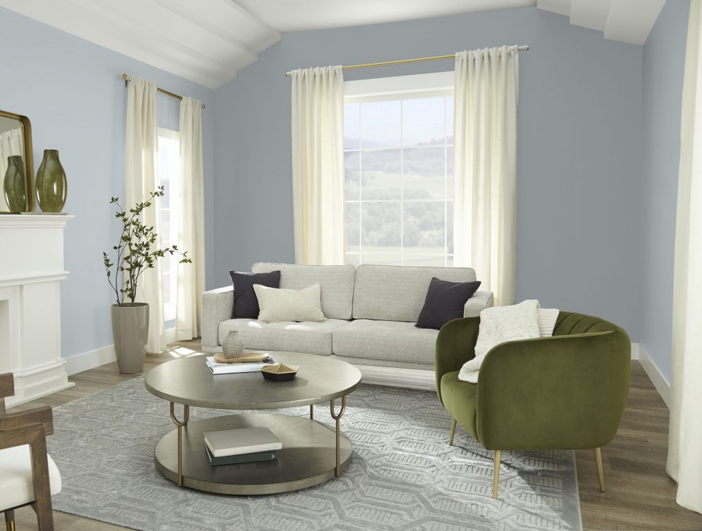 a living room with silvery blue walls.
