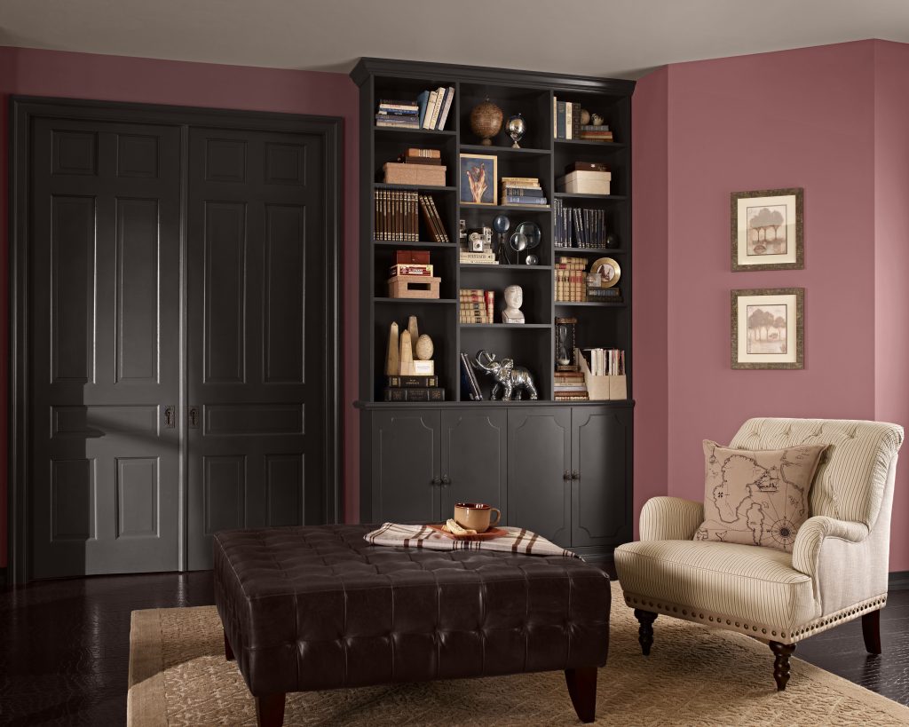 Library enveloped in a muted, dusty rose-inspired shade that adds depth and softness, transforming the room into a cozy, layered retreat.