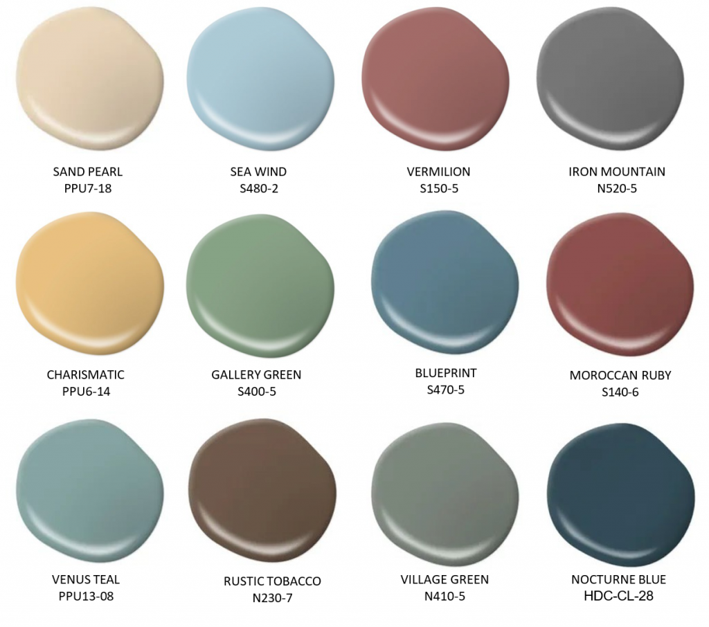A Colonial-inspired paint palette featuring warm neutrals, soft blues, muted greens, deep gray, earthy brown, and rich red accents. Colors shown include Sand Pearl, Sea Wind, Vermillion, Iron Mountain, Charismatic, Gallery Green, Blueprint, Moroccan Ruby, Venus Teal, Rustic Tobacco, Village Green, and Nocturne Blue.