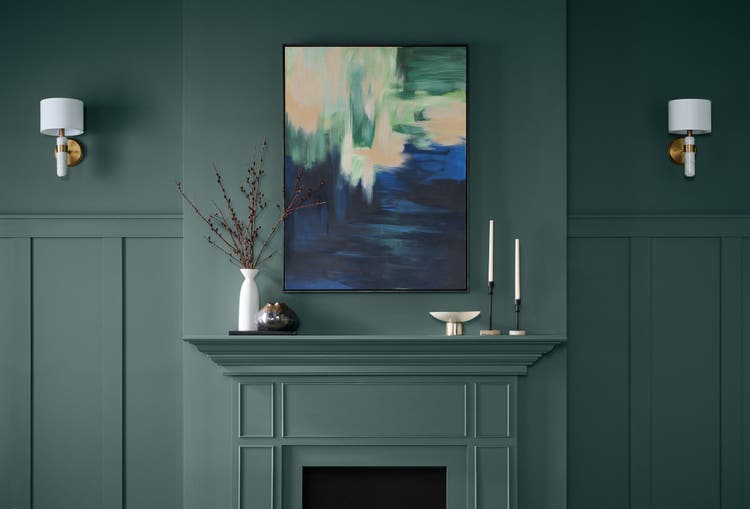 Living room fireplace and walls painted in the Behr 2026 Color of the Year Hidden Gem N430-6A