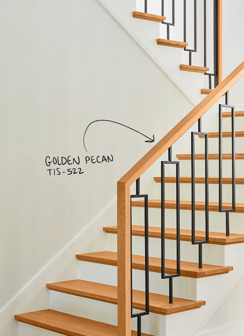 A wooden staircase that has been stained a warm, brown color