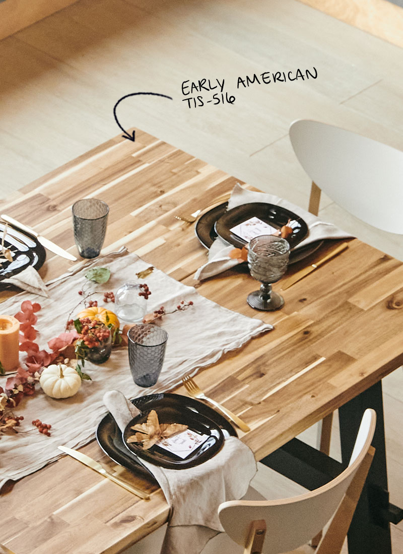 An inviting wood table stained to coordinate with the floor