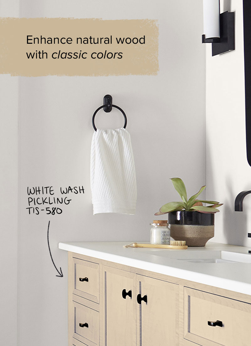 A bathroom vanity with wood that has been stained