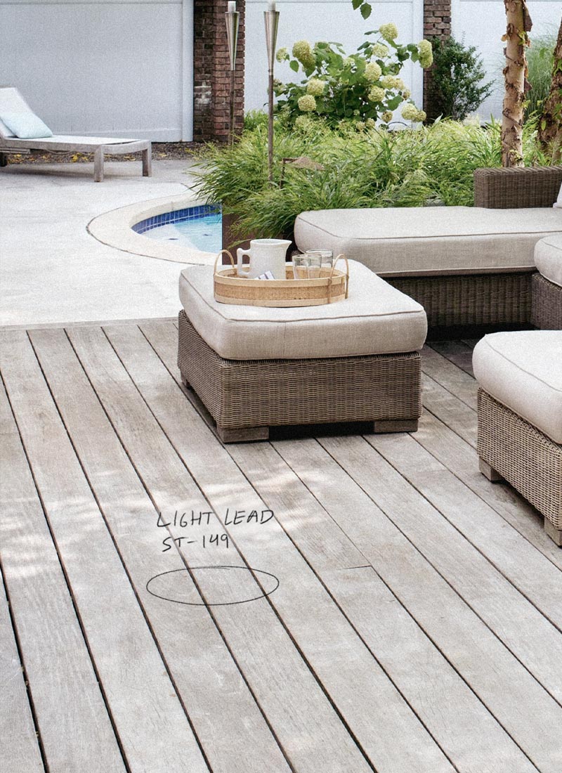 Home deck, stained in Light Lead, Behr Premium Semi-Transparent Waterproofing Stain & Sealer.
