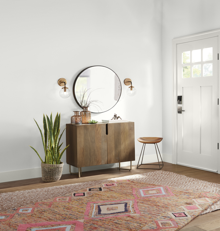 Eclectic entryway with Winds Breath walls and Polar Bear trim and door