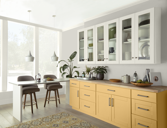 Eclectic kitchen with Charismatic bottom cabinets, Natural White top cabinets, and Gratifying Gray walls