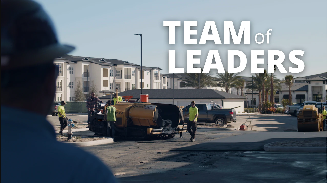 image of construction site with Team of Leaders headline