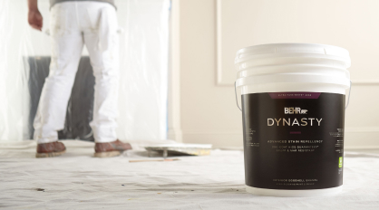 Pro painter paints wall with BEHR DYNASTY INTERIOR Paint